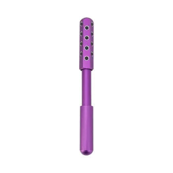 Purple handheld facial massage roller with textured surface on a white background.