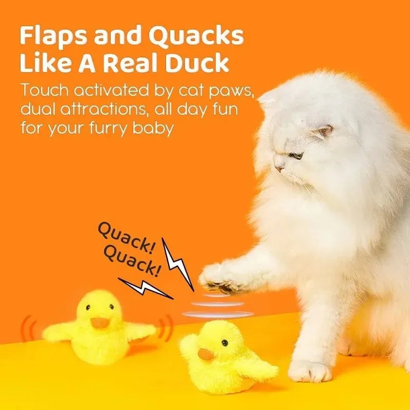 Yellow flapping duck plush cat toy with vibration sensor on a grey background.