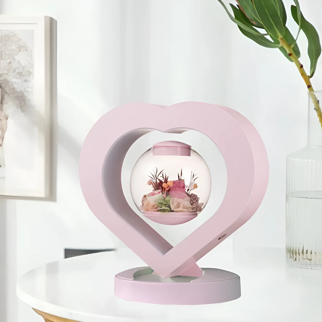 Pink preserved rose ornament in a gift box with optional bluetooth base and international plugs