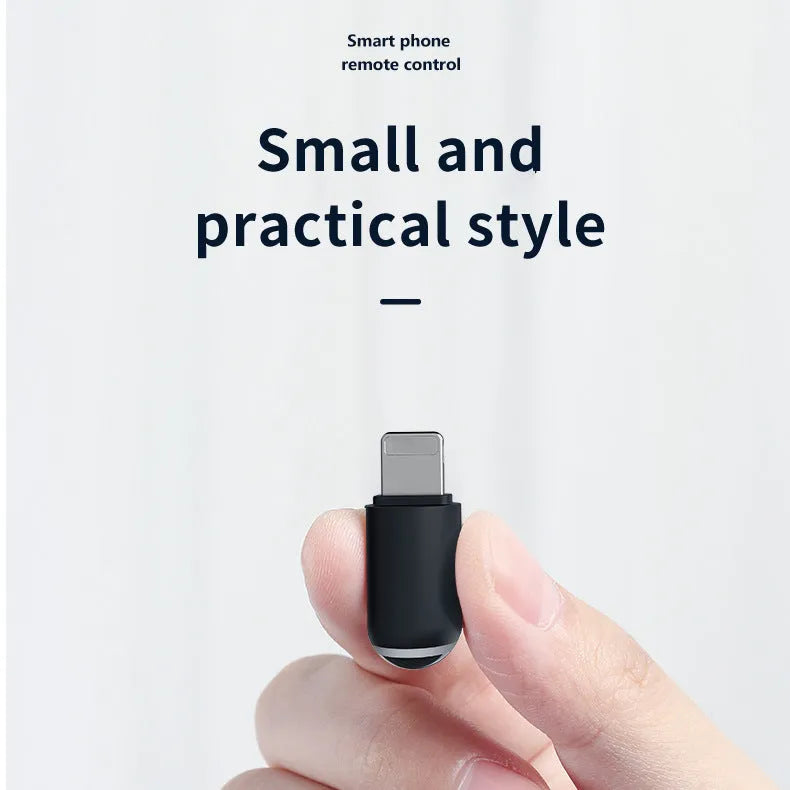 Small black capsule infrared remote emitter for smartphone Lightning, Type-C, and Micro-USB ports.