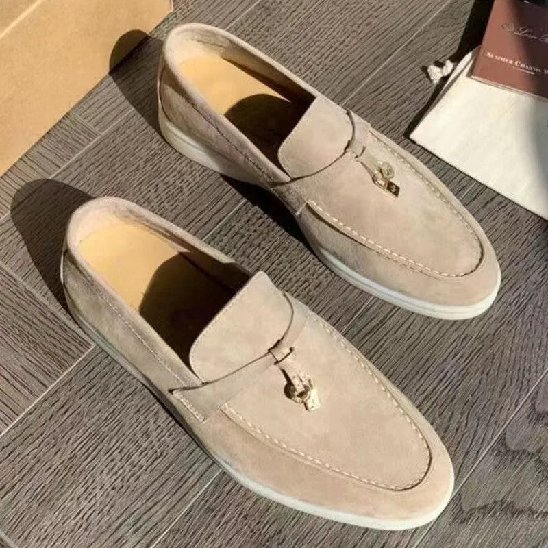 Unisex slip-on casual loafers with rubber soles in various colours on a white background.
