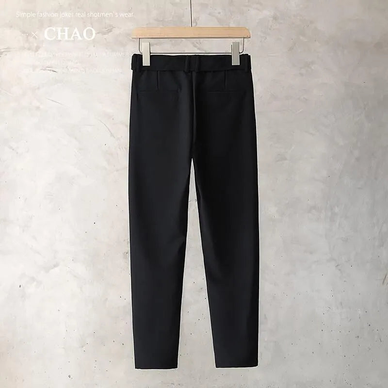 Boys slim straight wool trousers in grey, showing tapered fit and straight leg opening.