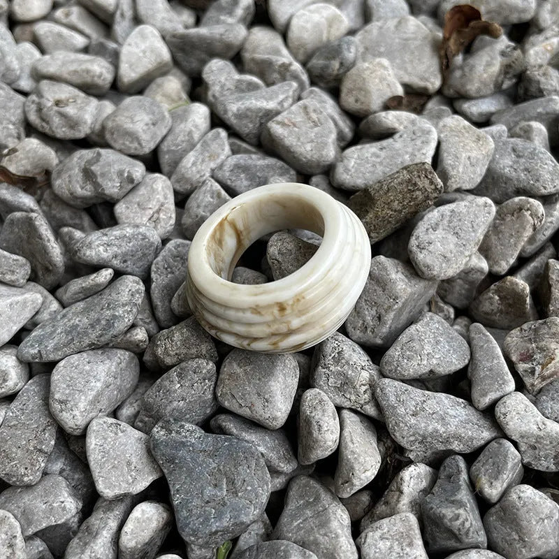 Geometric irregular resin ring in free size, shown in Maillard brown colour.