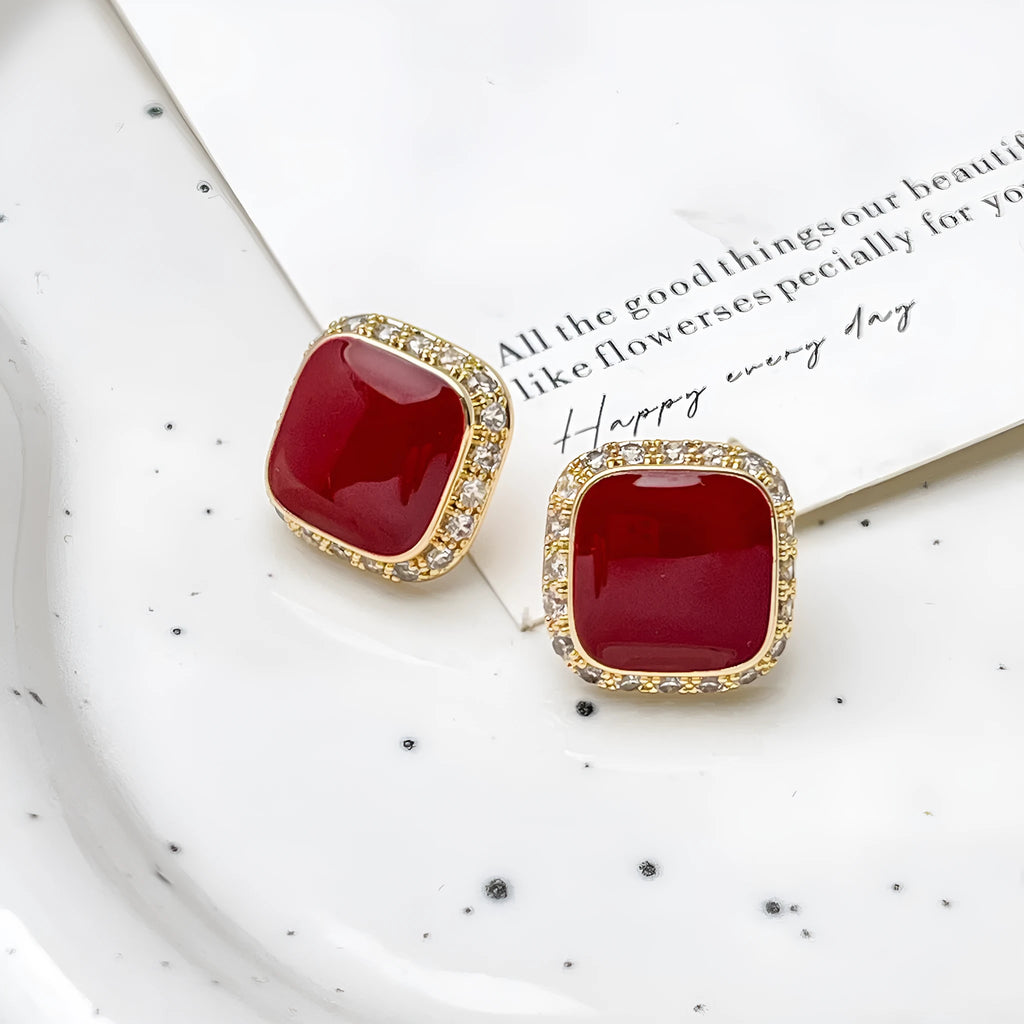 Red square-shaped alloy earrings for women with geometric design and Seiko-treated finish.