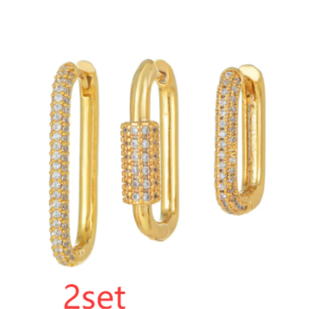 Three geometric ear clips with micro inlaid zircon in gold and white metal colours