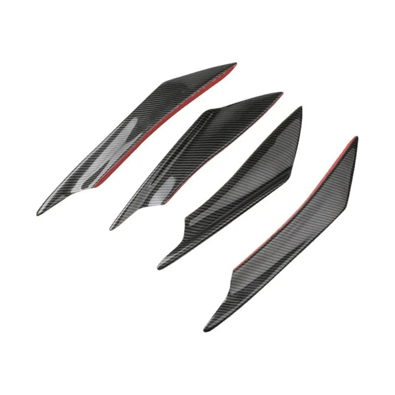 Set of four carbon fibre pattern automotive bumper blades mounted on vehicle