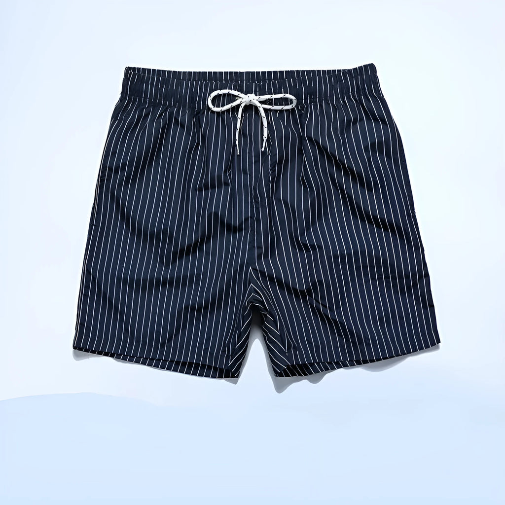 Polyester striped beach shorts with triangle lining in navy blue colour with straight leg openings