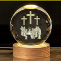 6cm white crystal ball with internal cross design on illuminated solid wood base