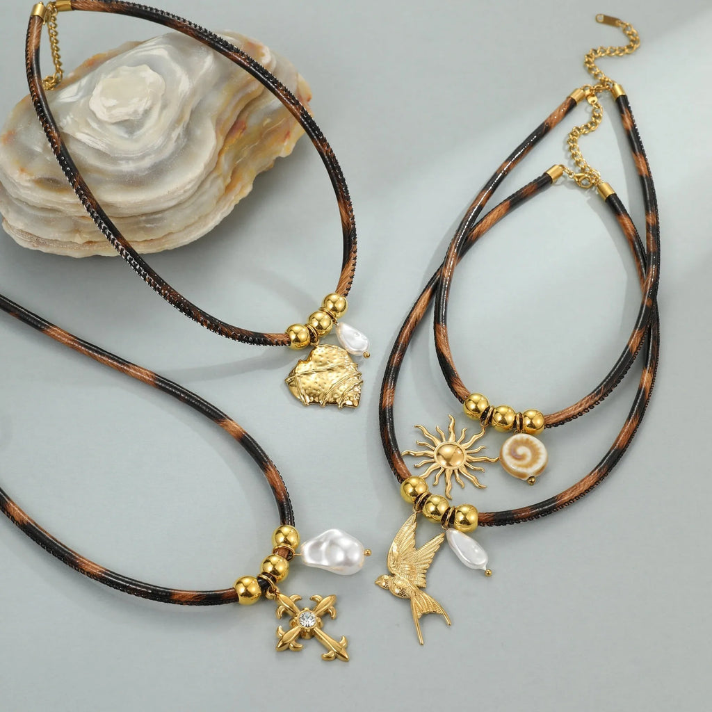 Geometric leopard pattern pendant necklace for women on an adjustable stainless steel chain with 18K gold plating.