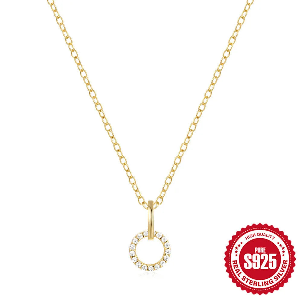Gold tone S925 sterling silver clavicle chain with geometric interlocking zircon pendant.