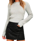 Slim fit long-sleeved acrylic pullover sweater in a light grey colour on a hanger.