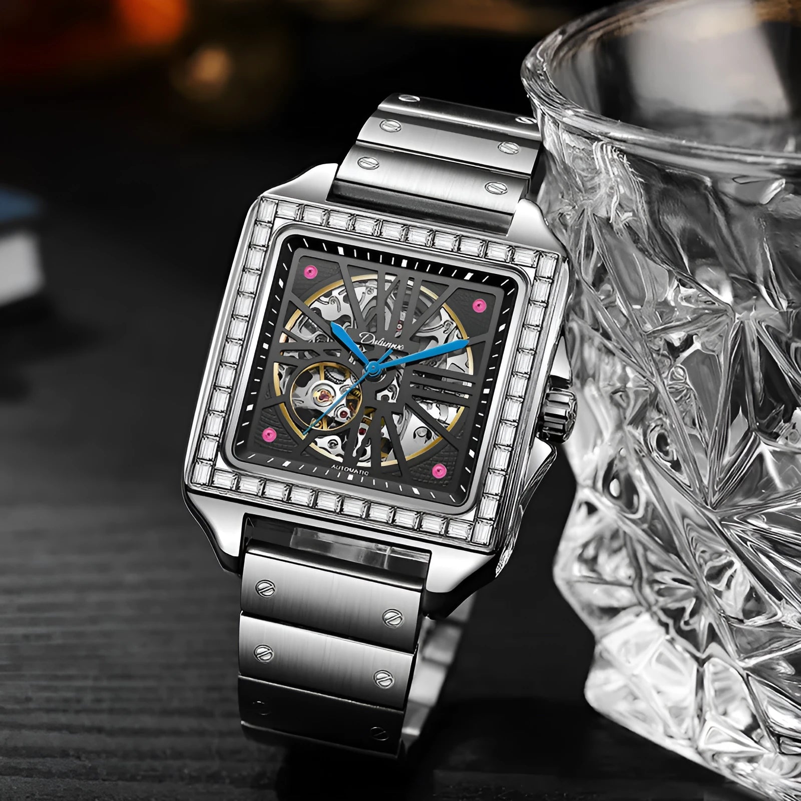 Men's square automatic watch with diamond-studded bezel on a steel bracelet