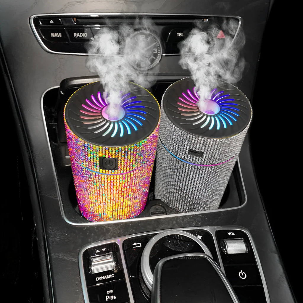 Compact white car air purifier and humidifier unit with USB cable on car dashboard