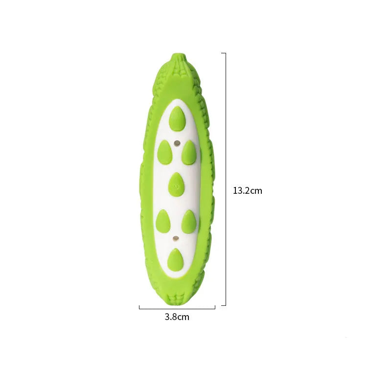 Green durable rubber dog chew toy with meat scent simulation for large breed biting resistance