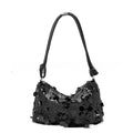 Soft polyester women's crossbody shoulder bag in black, shown from the front.