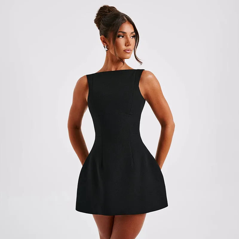 Slim-fitting black backless sleeveless summer dress with high waist on a model.