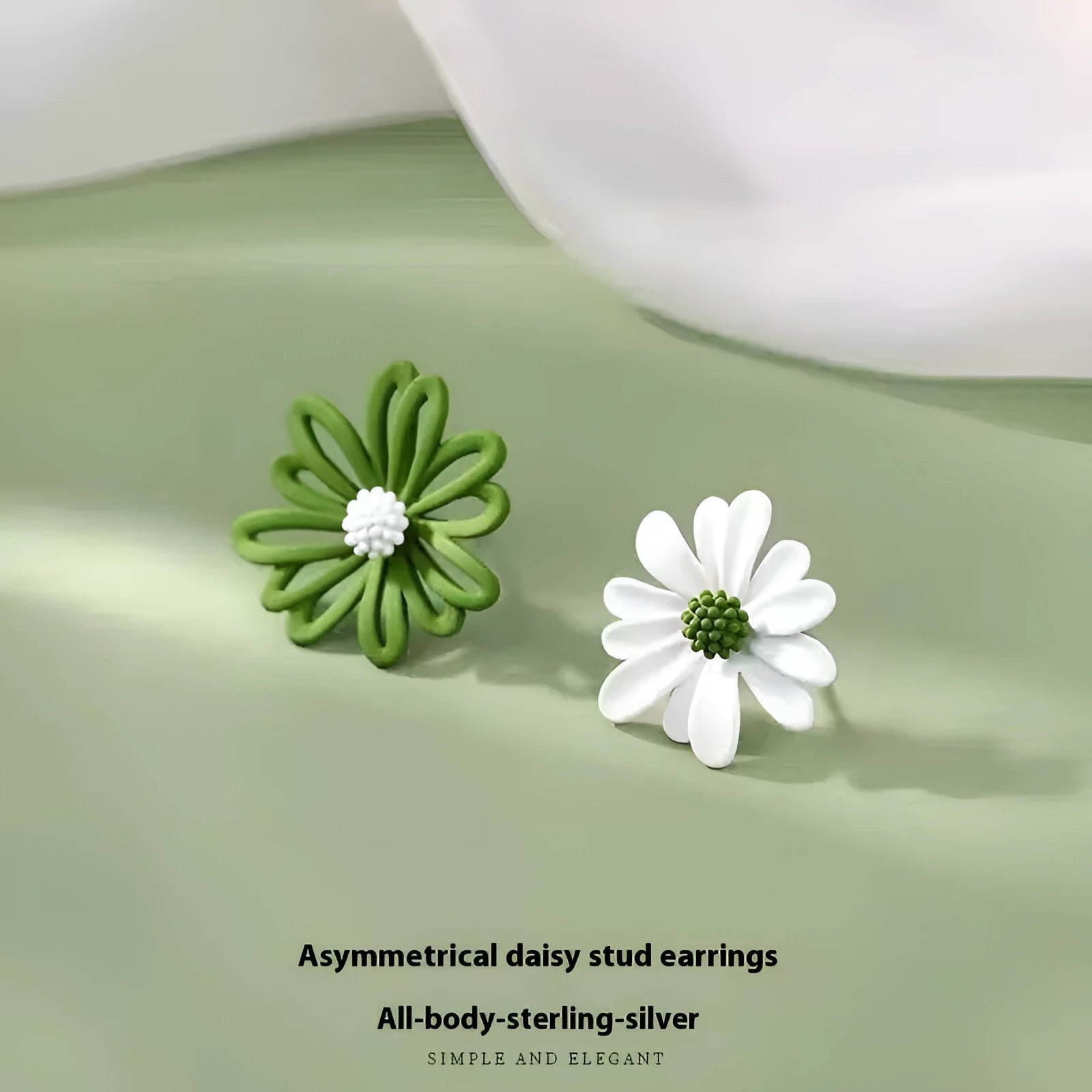 Alloy cartoon flower stud earrings in blue and orange, white and green, or yellow and white two-tone colours.
