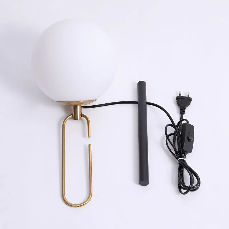 Modern clear glass wall lamp with dimmable LED light in three colour temperatures