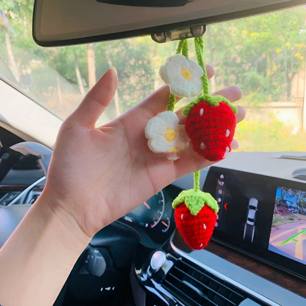 Handmade strawberry-shaped car pendant made from knitted cotton and hemp wool.