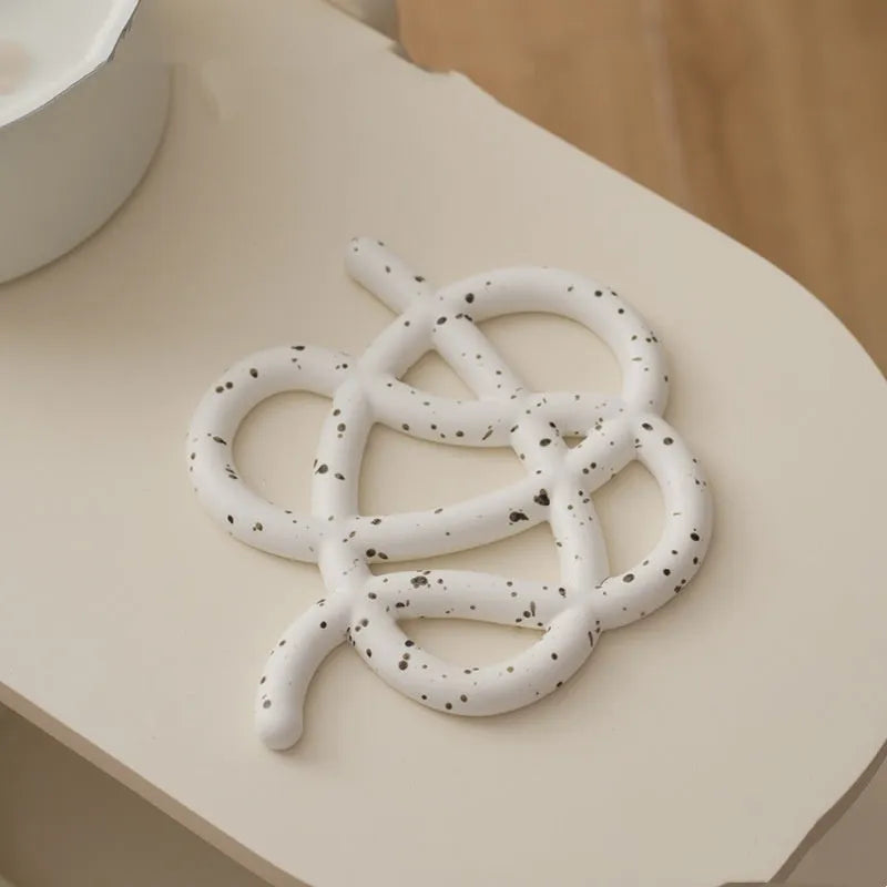 Ceramic heat proof mat in irregular shape with modern solid colour design for table protection