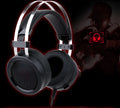 Black wired over-ear PC gaming headset with a 3.5mm plug and long cable.