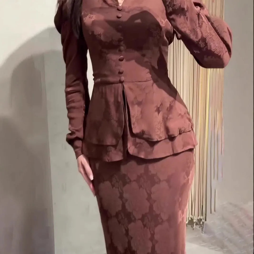 Dark brown women's retro dress with button front, long sleeves, and floral pattern.