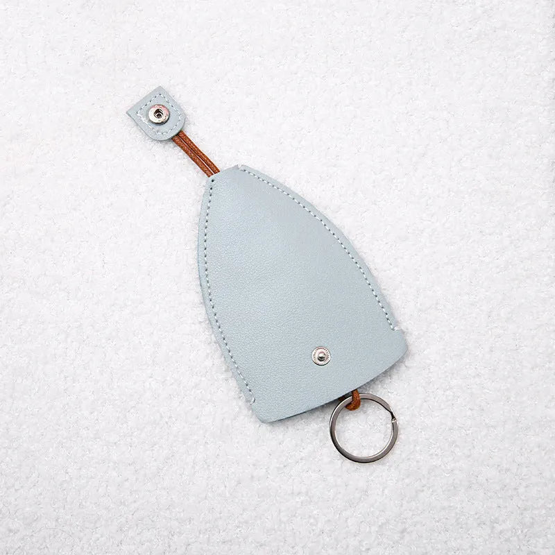 Colourful cartoon pull-out key case made from PU leather showing design options