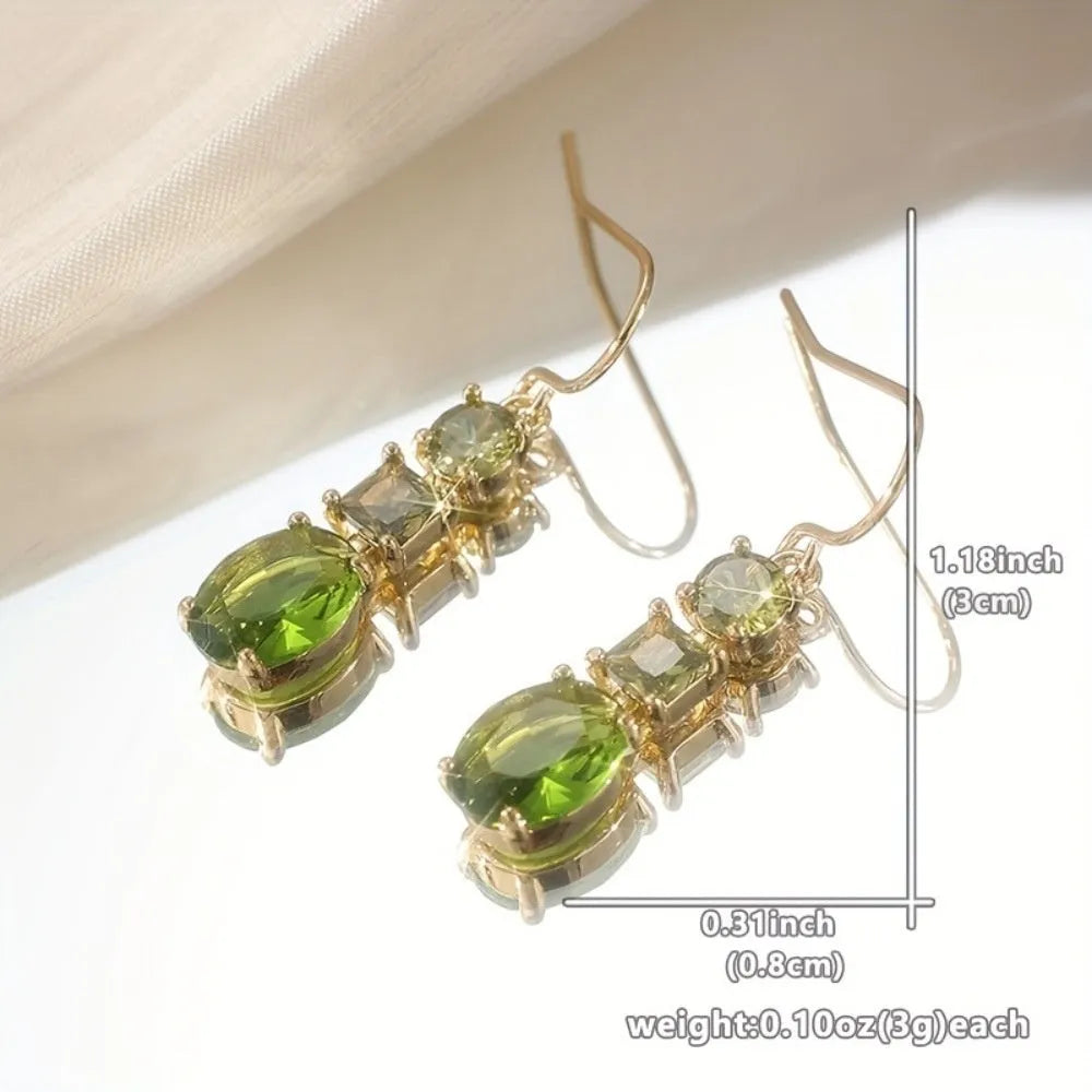 Green geometric quadrilateral copper earrings in a retro Bohemian unisex style.