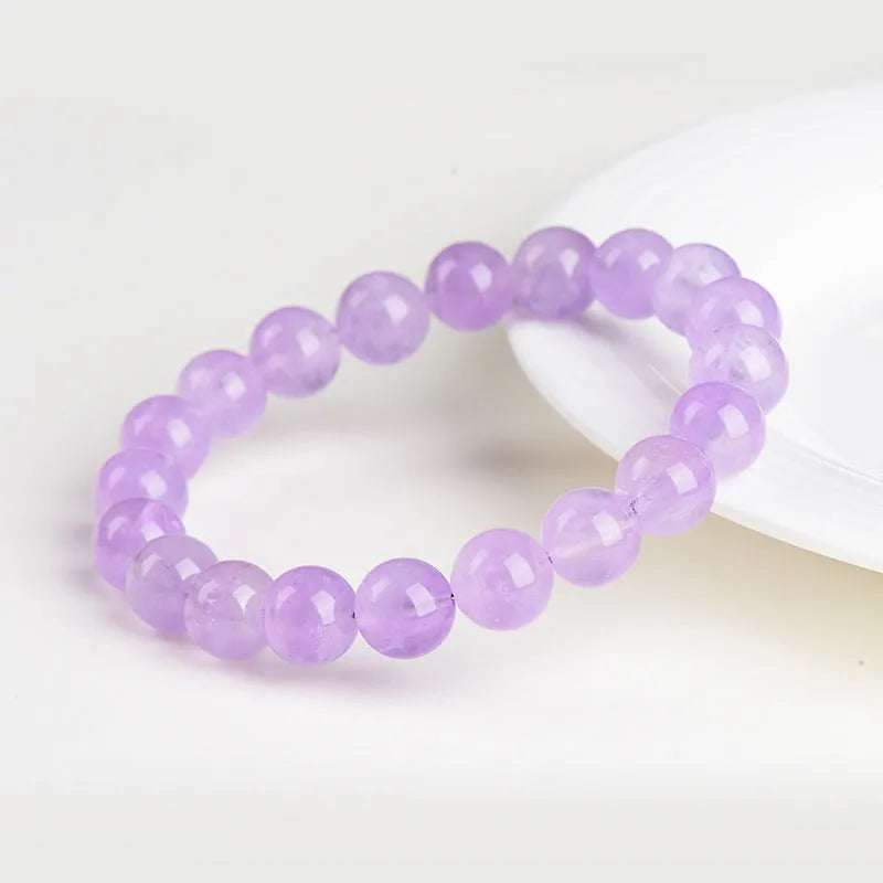 Lavender amethyst geometric water ripple bracelet with round beads on wrist