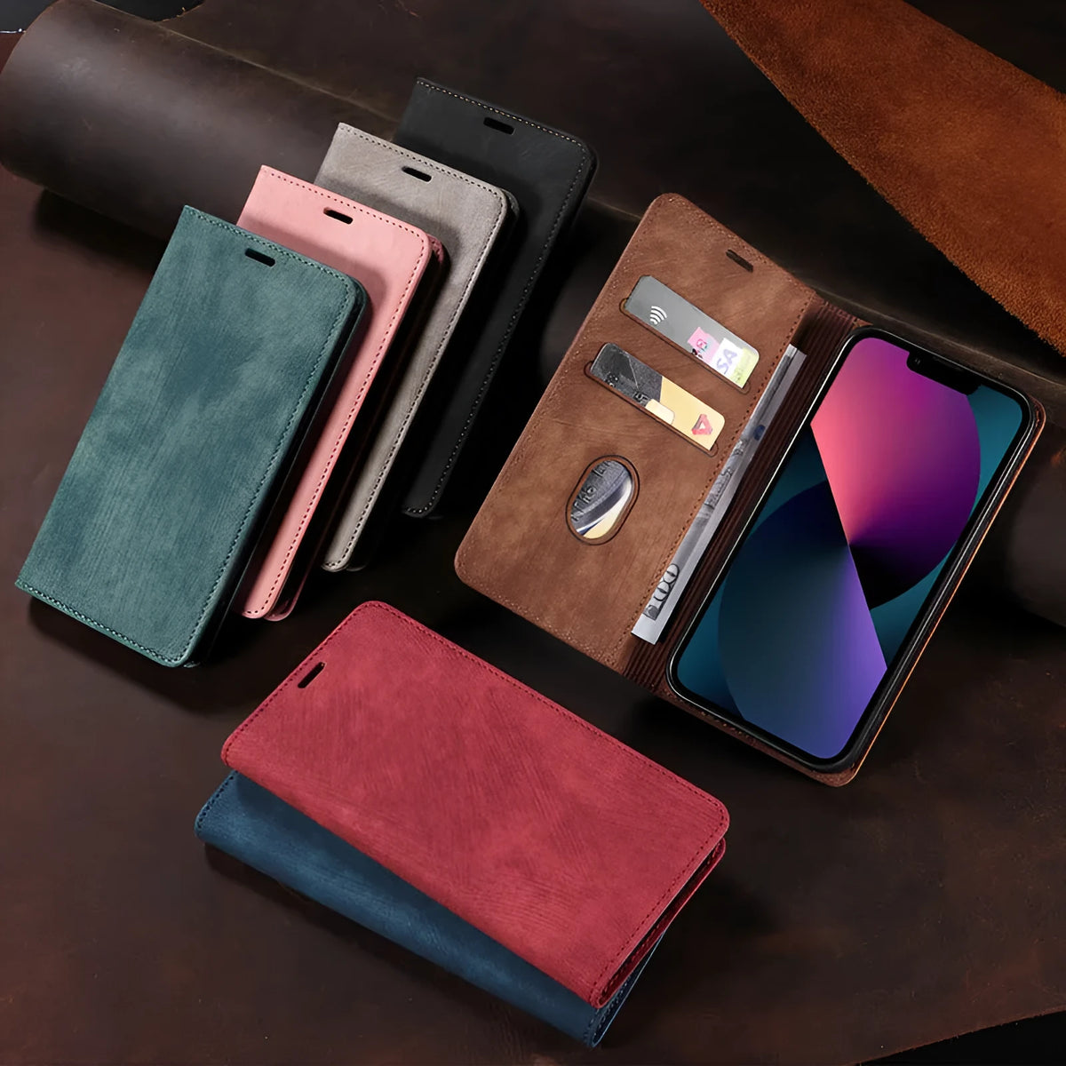 Magnetic flip leather phone case for iPhone in grey, lake green, and pink colours.