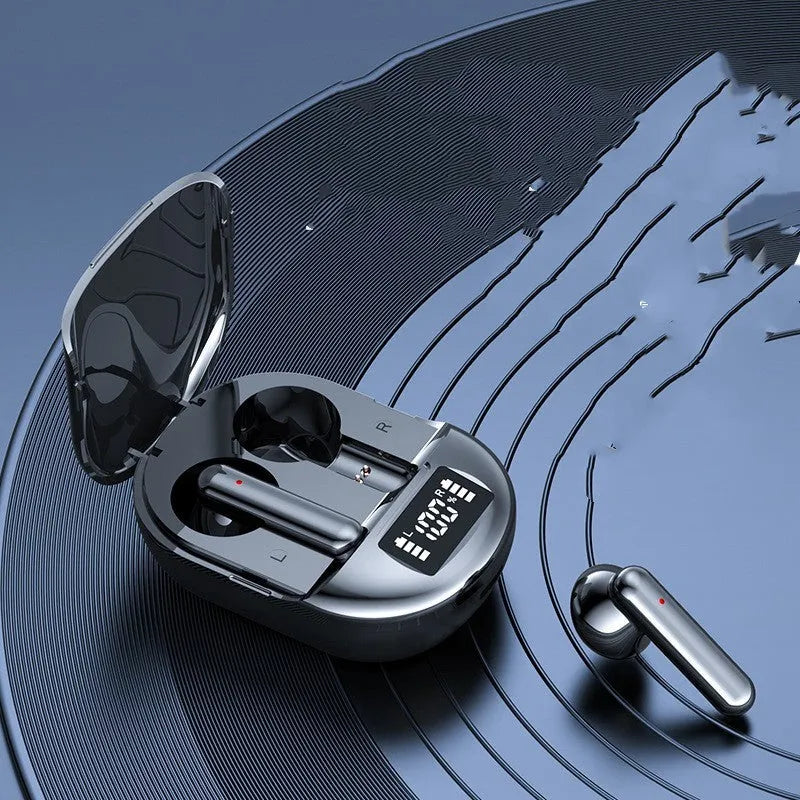 Black and white wireless Bluetooth in-ear headset with charging case showing digital display screen