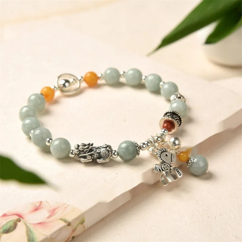 Natural jade vintage bracelet with 8-9mm beads and alloy metal accents on wrist