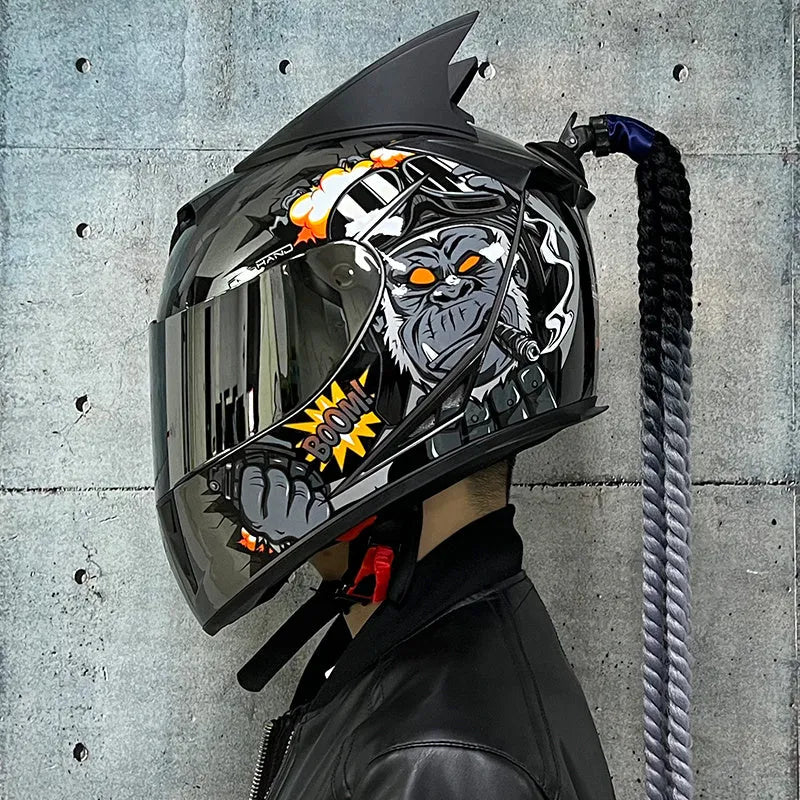 Couples motorcycle helmets with graphic designs in black, blue, and grey colours