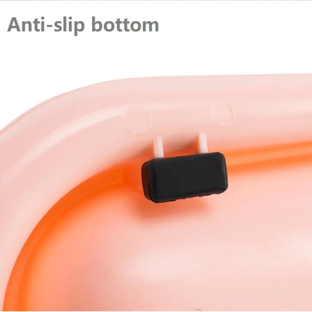 Green 4-piece pet feeder set with two bowls on a non-slip silicone mat