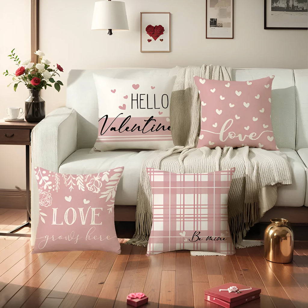 Square red and white plaid heart printed Valentine's Day pillow cover on a sofa.