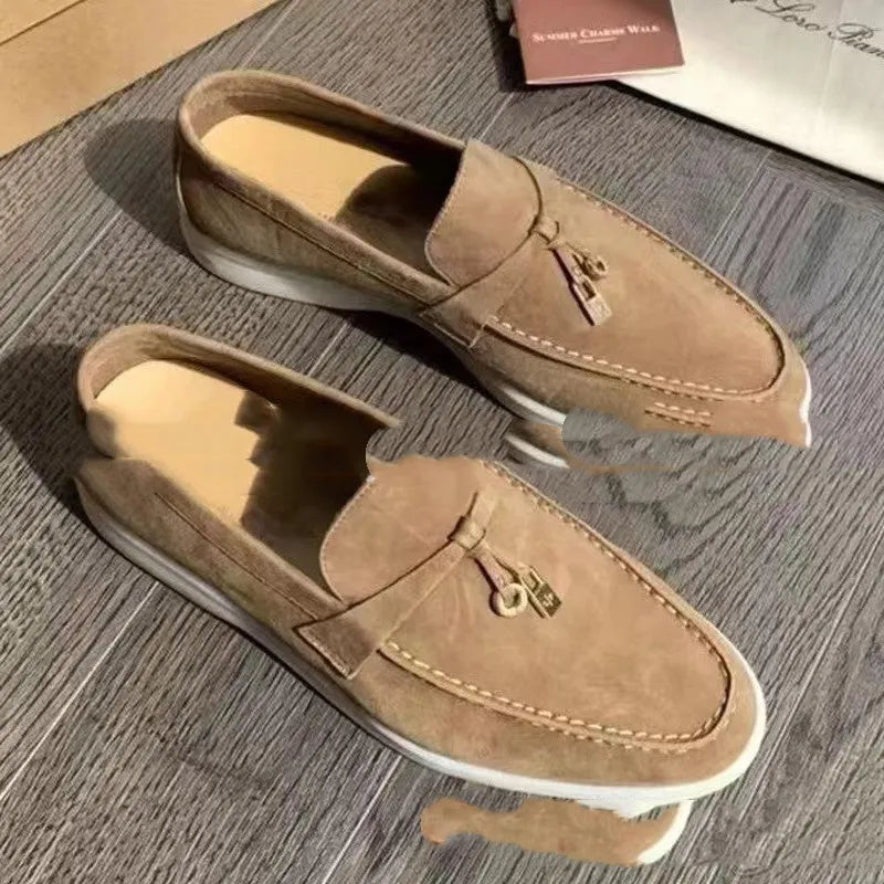Unisex slip-on casual loafers with rubber soles in various colours on a white background.