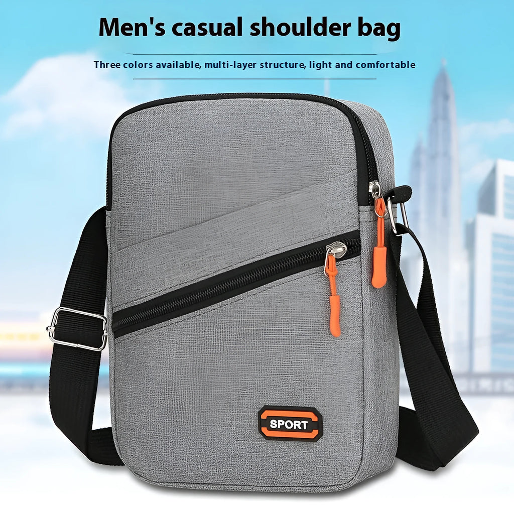 Solid colour Oxford cloth crossbody commuter bag with contrast details in silver grey.