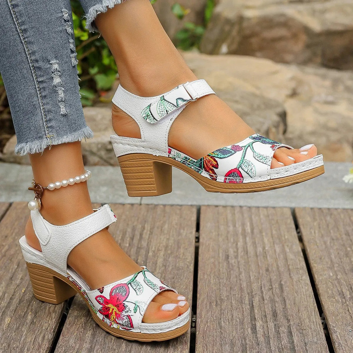 White women's high heel casual sandals with a visible Velcro strap buckle on the instep.