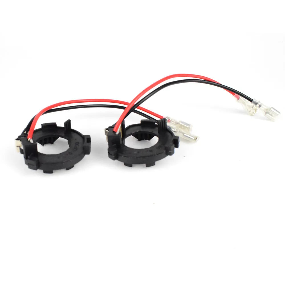 Black plastic H7 LED headlight adapter bracket with copper wiring for Volkswagen cars.