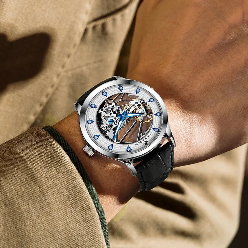 Men's silver case mechanical watch with white dial, blue luminous hands, and black genuine leather strap