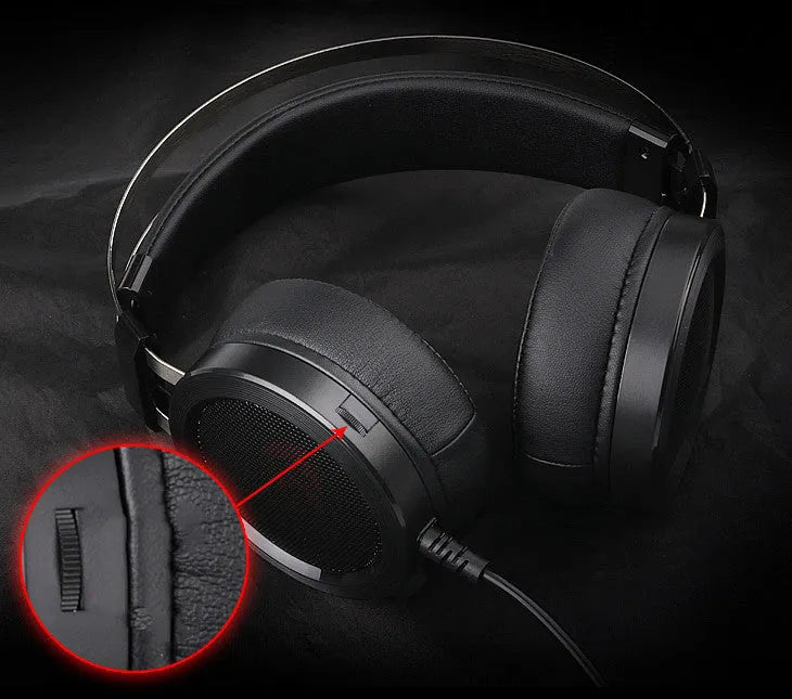 Black wired over-ear PC gaming headset with a 3.5mm plug and long cable.