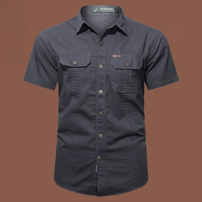 Men's short sleeve cotton work shirt in loose fit cardigan style showing non-ironing construction