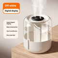 Beige round USB-powered humidifier with dual spray mist outlets and a digital humidity display.