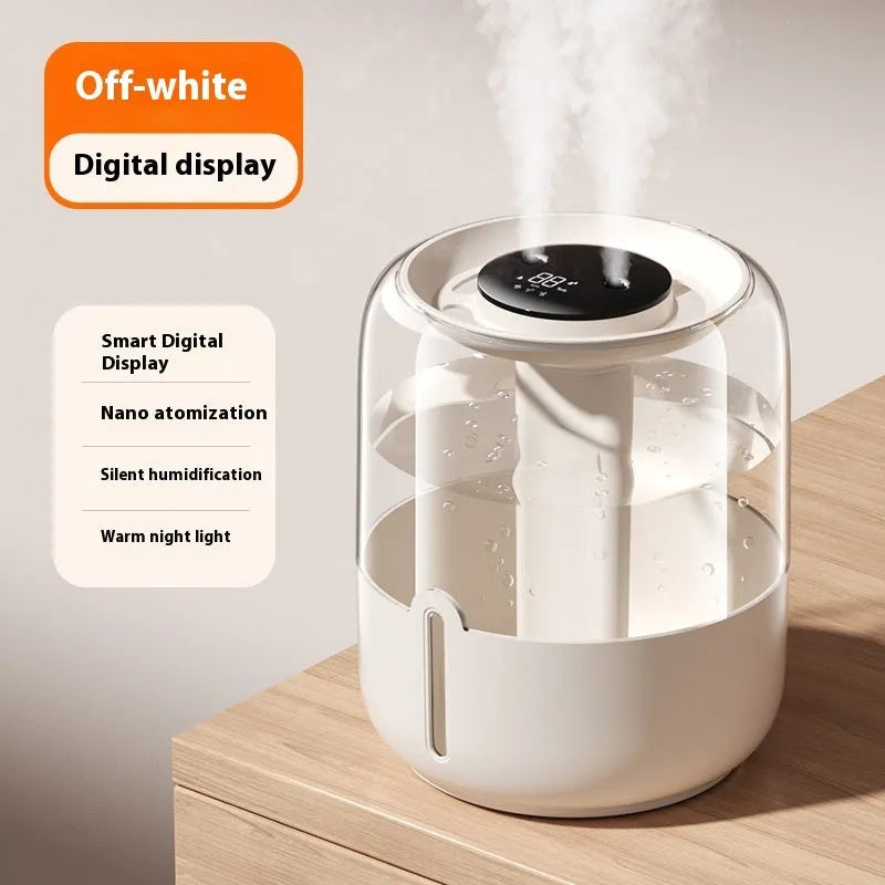 Beige round USB-powered humidifier with dual spray mist outlets and a digital humidity display.