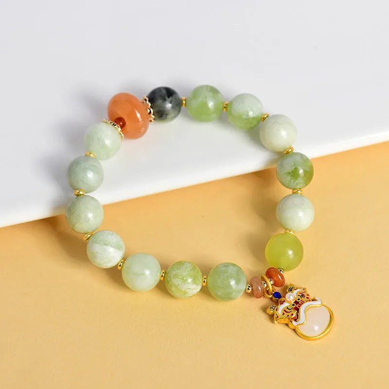 Green milk-in-water Xingshi pendant bracelet with 10mm geometric jade bead
