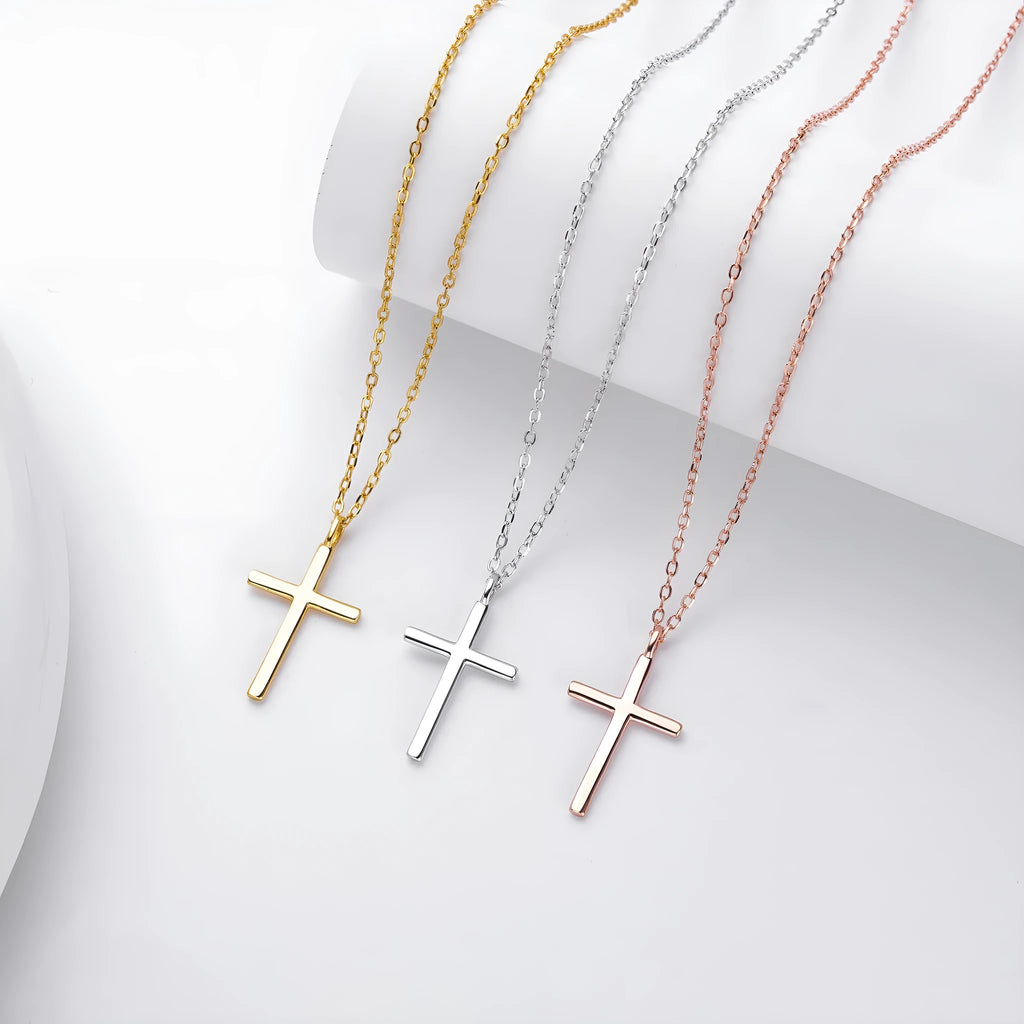 Sterling silver cross pendant necklace on an adjustable O-chain in gold, platinum, or rose gold plating.