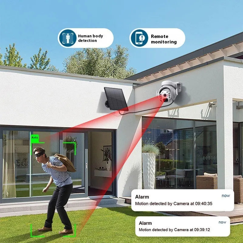 White solar-powered outdoor security camera with solar panel on top, mounted on a wall.