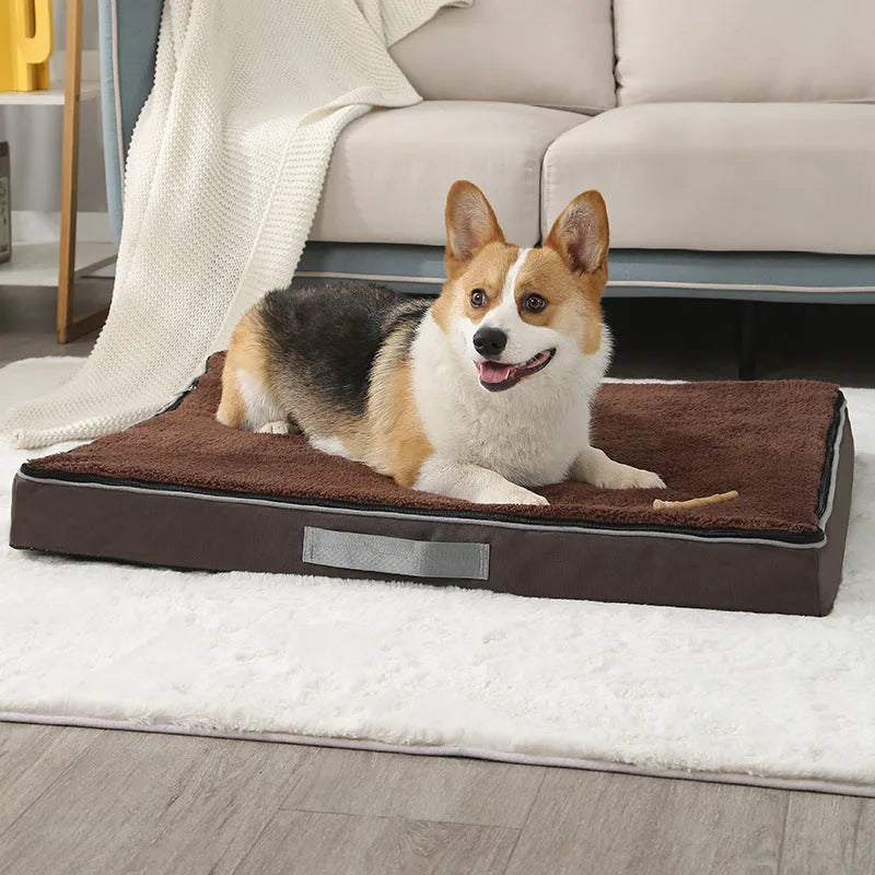 Brown removable washable memory sponge dog mattress pad on a wooden floor.