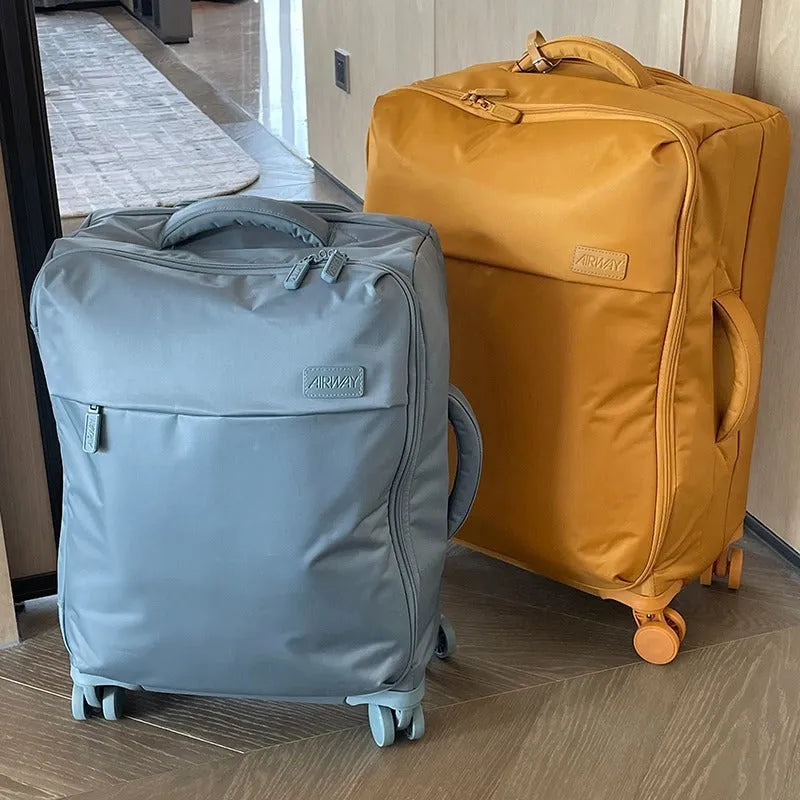 20-inch waterproof Oxford cloth suitcase in bluestone green colour with universal wheels and antibacterial lining