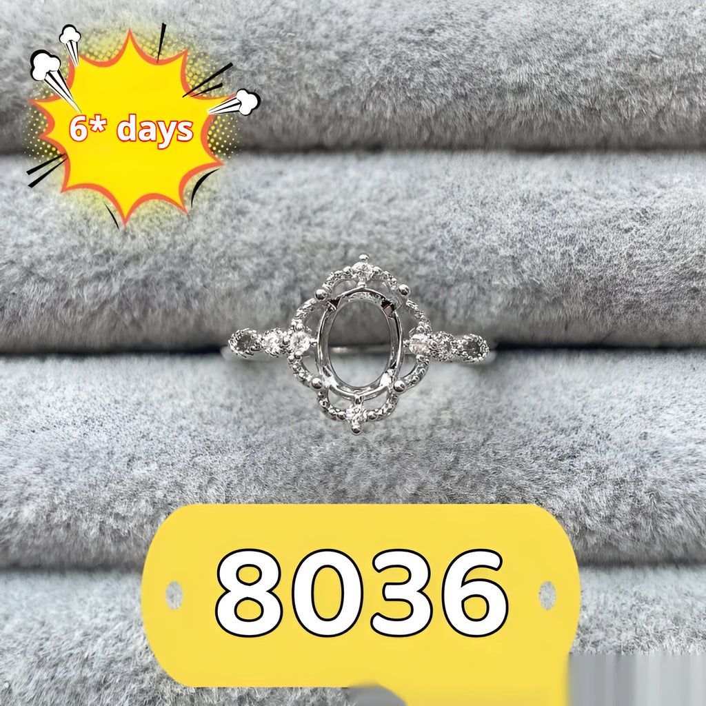 Oval denier ring with 6x8mm stone, open mouth design, and five-pointed star detail